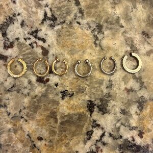 These are clip on studs as a fake piercing